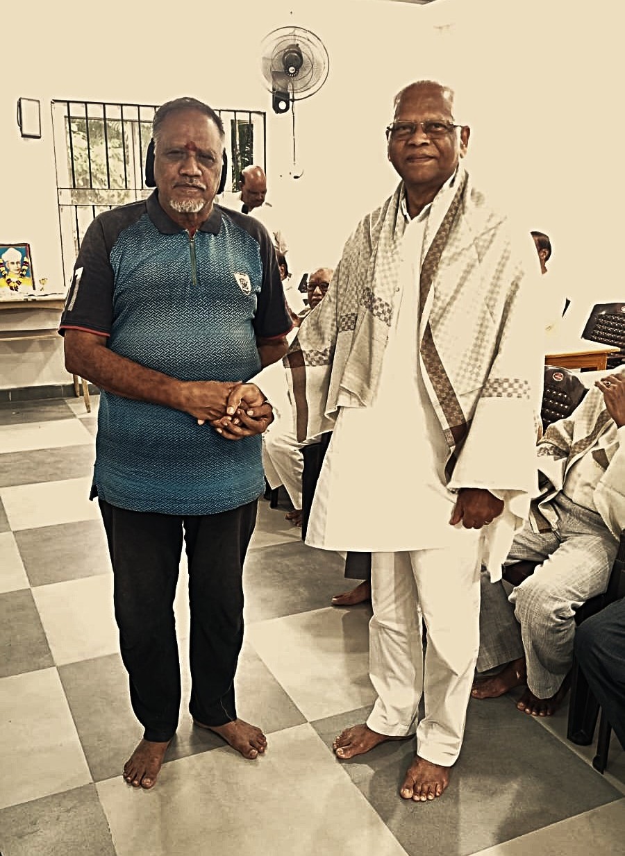 Honouring teacher M I Shouraiah Rao Garu by K Vijayaanand garu  in teachers day celebrations.jpg